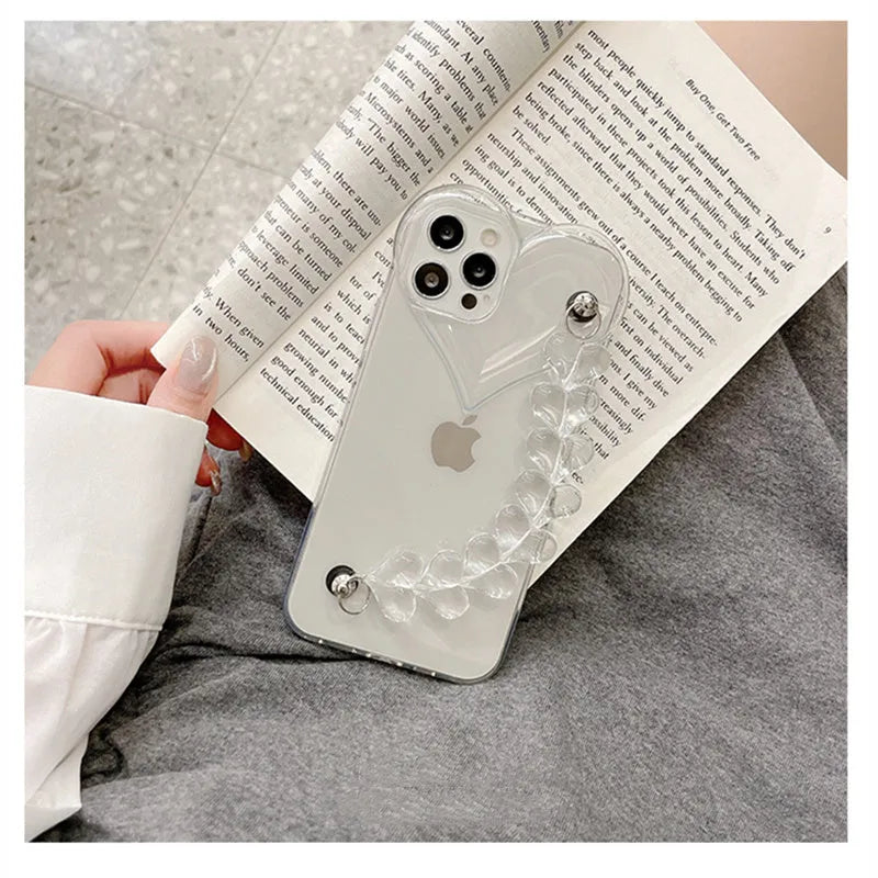 Transparent iPhone case with love bracelet chain design for Apple models 7 through 13 Pro Max