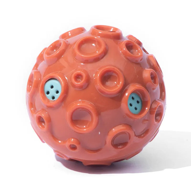 Durable rubber dog chew ball in multiple colours with squeaky sound and teeth-cleaning bumps.