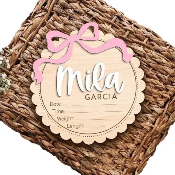 Square wooden baby room ornament with custom name engraving for nursery decor.