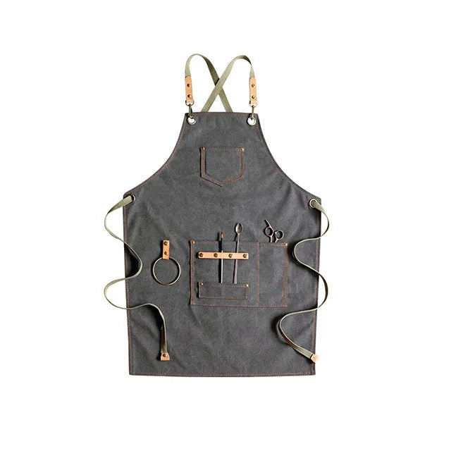 Canvas apron with cross-back straps in camel colour