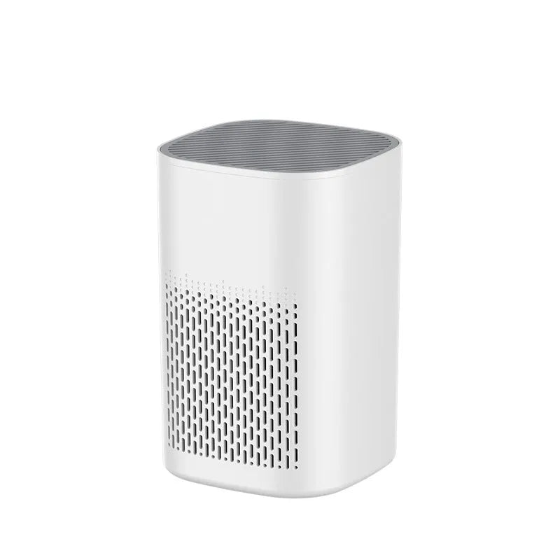Compact desktop air purifier with USB cable connection and simple modern design