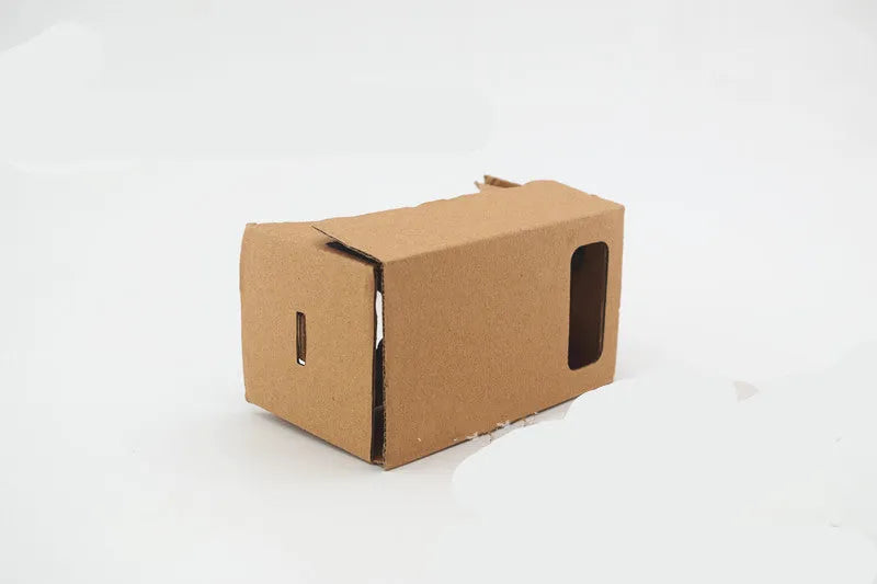 Pink and white VR cardboard glasses for 6-inch smartphones with adjustable head strap.