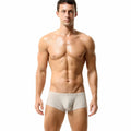 Solid colour low waist men's boxers in nylon fabric on a white background