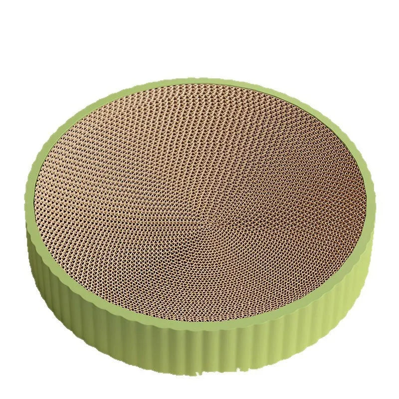 Round green and white cat scratching board with corrugated paper surface and replacement pads