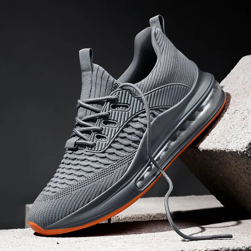Men's black low-top mesh running shoes with a round toe and lace-up front on a white background.