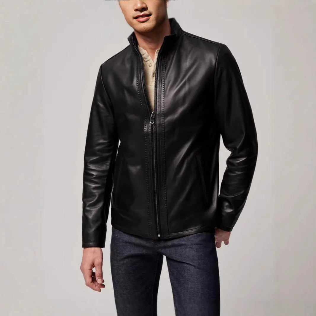 Black men's retro leather jacket with long sleeves and straight hem on a hanger
