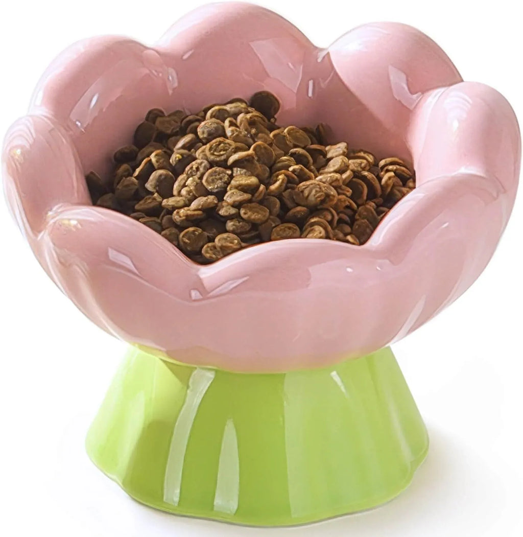 Pink ceramic raised cat bowl with flower shape and non-slip base, 15-degree angle, for small to medium cats