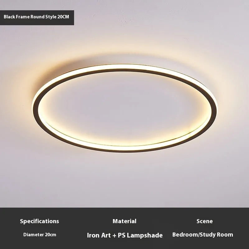 Minimalist circular dimmable LED ceiling lamp in black, gold or white finish.