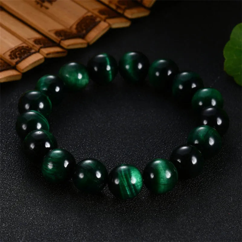 Green tiger eye stone bracelet with polished geometry beads showing five size options