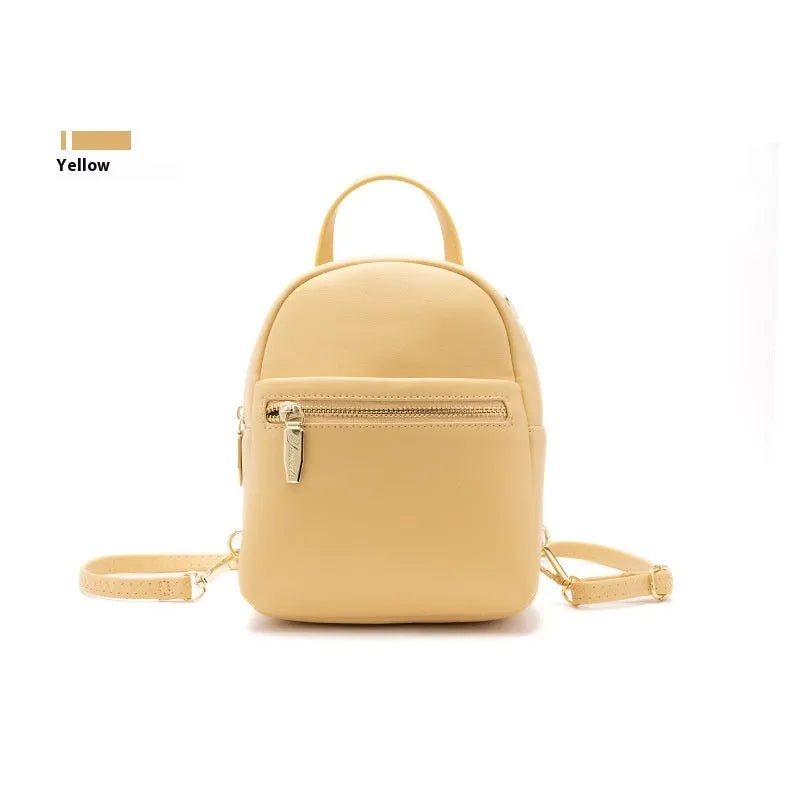 Soft PU mini backpack in street trend style with contrast colour detailing and external pocket.