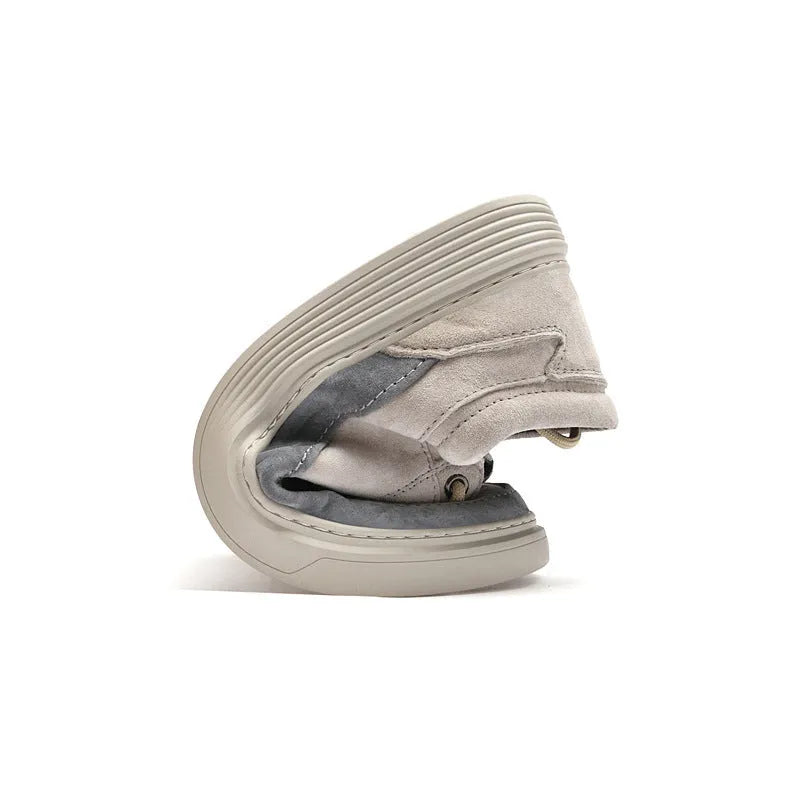 Men's grey casual leather skate shoes with low-top design and round toe on a rubber sole.