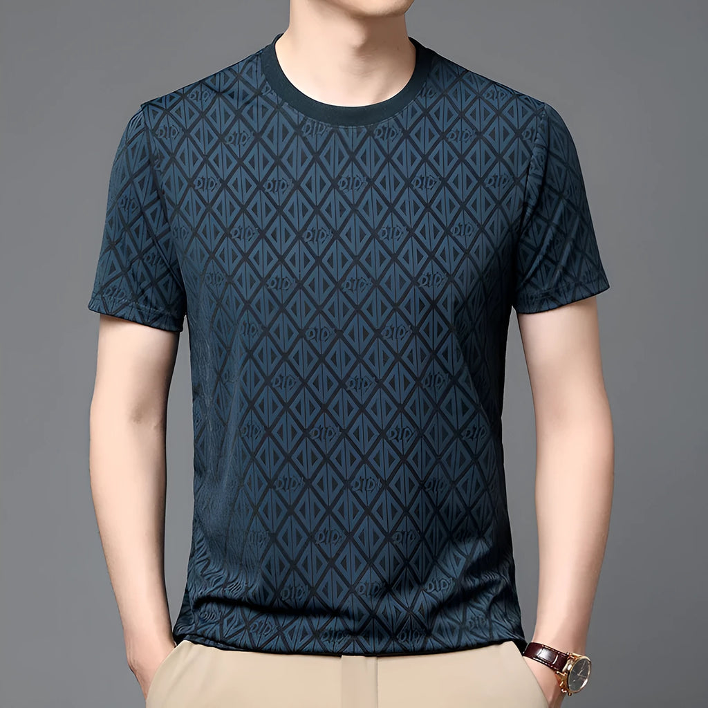 Man wearing a solid colour loose-fit Jacquard pattern short sleeve t-shirt for casual leisure.