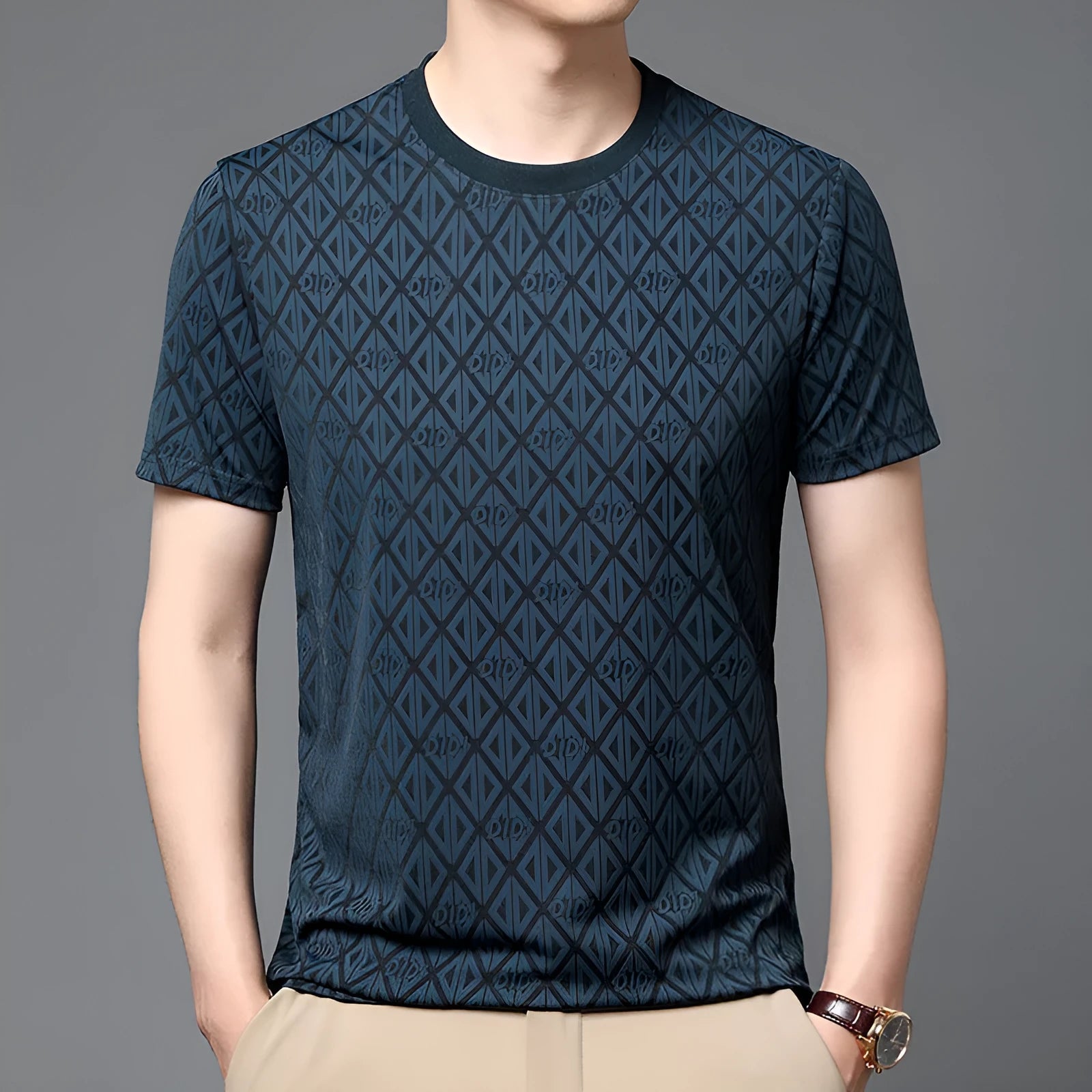 Man wearing a solid colour loose-fit Jacquard pattern short sleeve t-shirt for casual leisure.