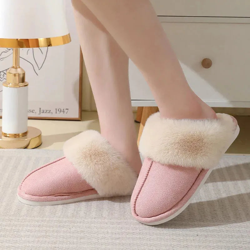 Women's plush winter slippers with round toe, available in brown, grey, pink and white.