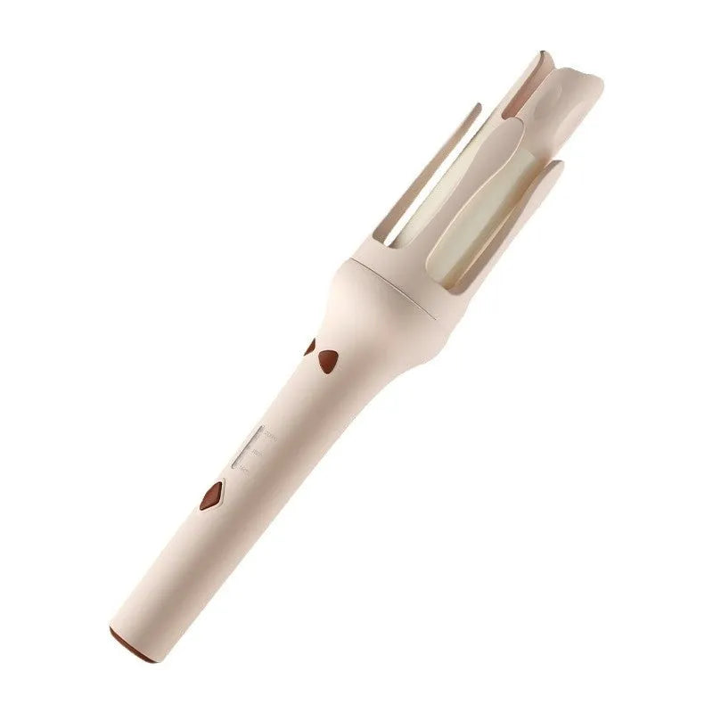 White and pink automatic hair curler with 32mm ceramic barrel and auto-clamp feature on a table.