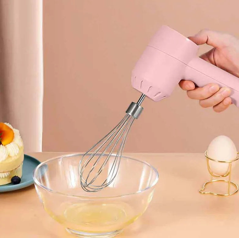 Portable mini wireless electric egg beater with USB charging, 3 speeds, and 2 stainless steel stirrers in green, pink, or white
