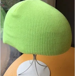 L-sized ski helmet with a knitted decorative cover and matching beanie in a choice of 15 colours.