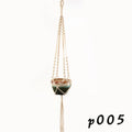A rustic-style woven cotton rope plant trellis panel supporting green leaves.