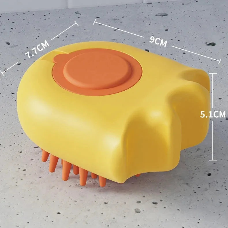 Blue pet bath brush and massage comb for dogs and cats with integrated shampoo box.