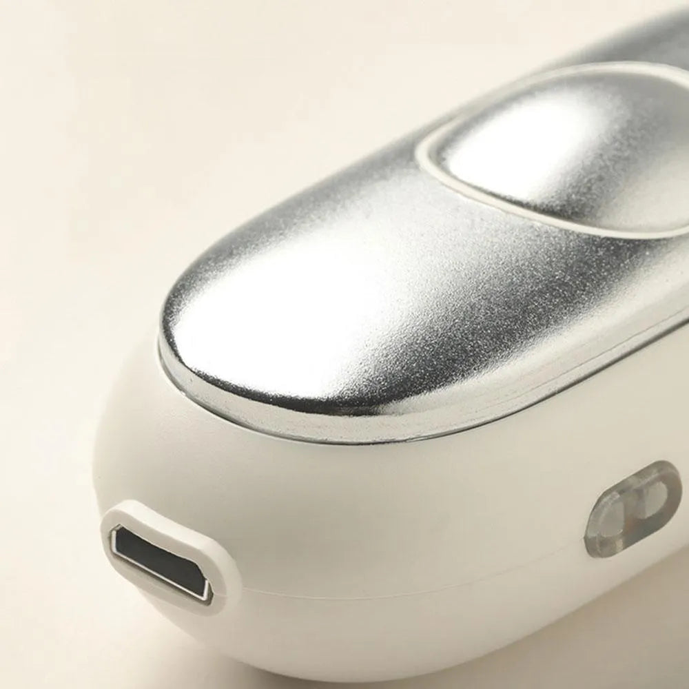 Handheld micro-current sleep aid device in grey, green, or orange colours with USB charging cable