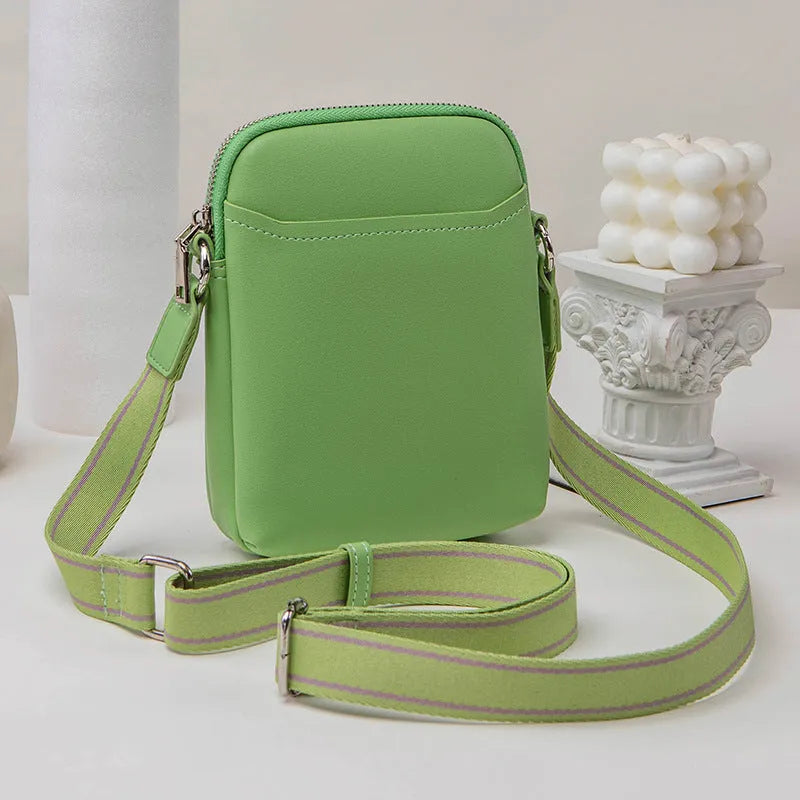 Solid colour PU leather crossbody phone bag in beige, shown with adjustable strap.