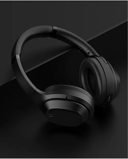 Black Gorsun E98 over-ear wireless Bluetooth headphones with adjustable headband and memory-protein ear cushions.