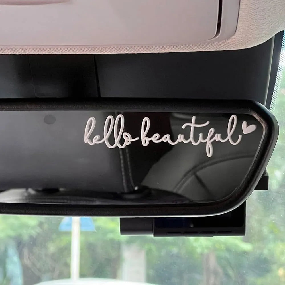 Plastic rearview mirror sticker 10x3cm in black on a car mirror