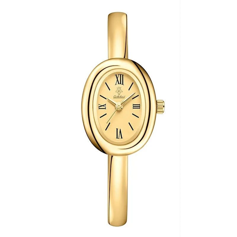Women's oval retro quartz watch in gold with spiral pattern and slim 8mm profile