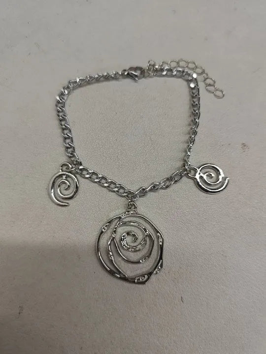 Spiral donut geometric jewellery set with necklace, bracelet, and earrings in gold electroplate