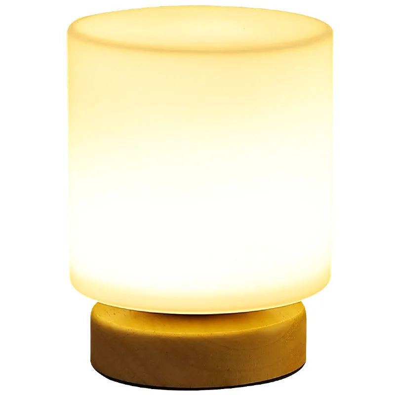 Nordic solid wood base USB table lamp in a choice of cube, column, cylinder, or ball shapes with touch dimming.