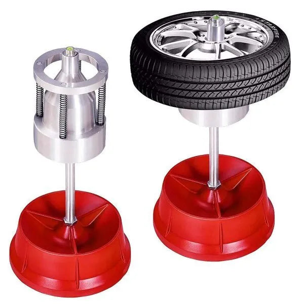 Portable aluminium hub wheel balancer with bull's eye level on a black enamel finished base.