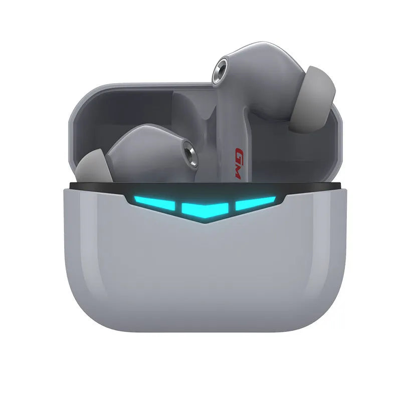 True wireless gaming earbuds and compact charging case in black, shown with silicone earmuffs.