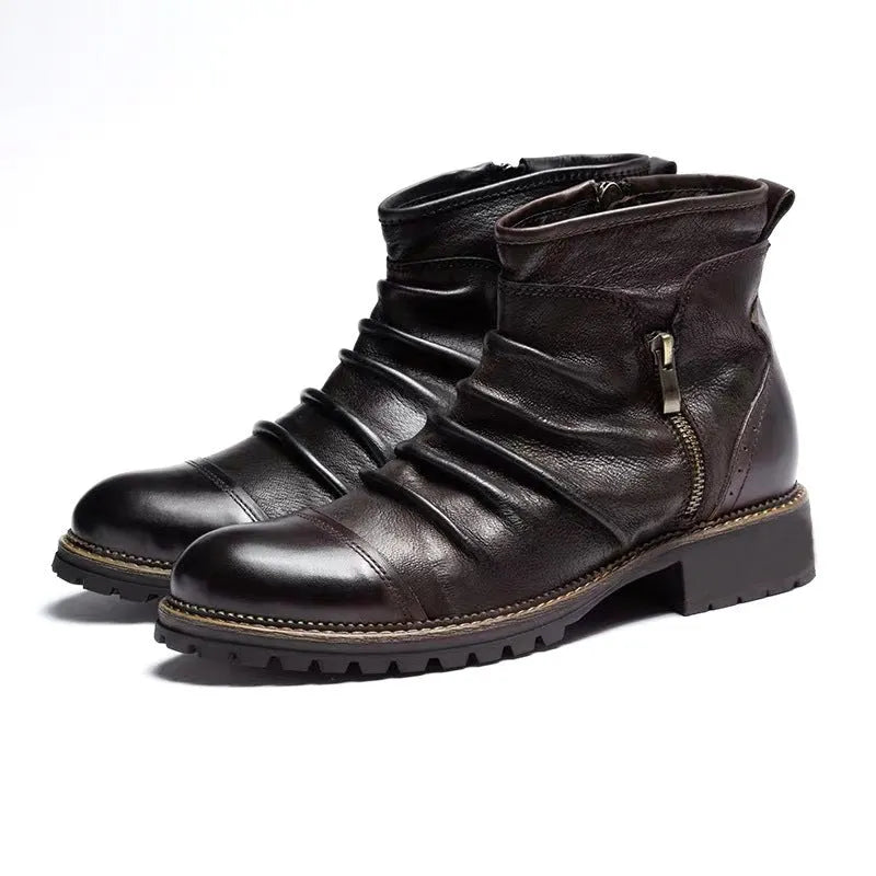 Black mid-calf cowboy boots with a side zipper, round toe, and a horseshoe heel on a plain background.