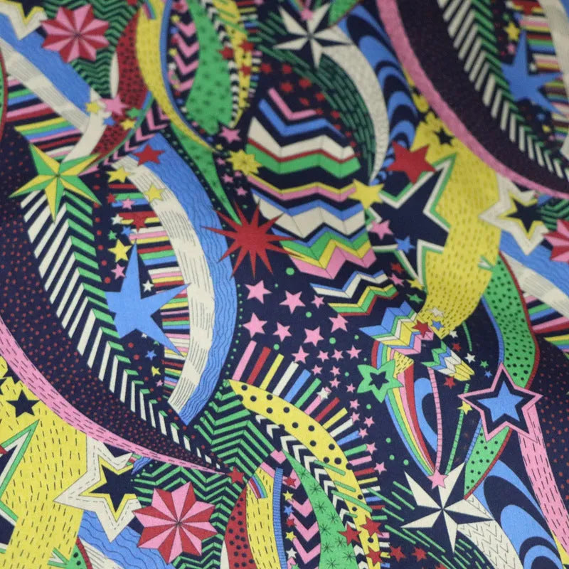 Blue digital print cotton fabric with plant and flower pattern showing 145cm width measurement