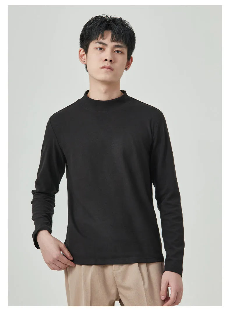 Man wearing a brown Dralon half-high collar long sleeve t-shirt for casual autumn wear.