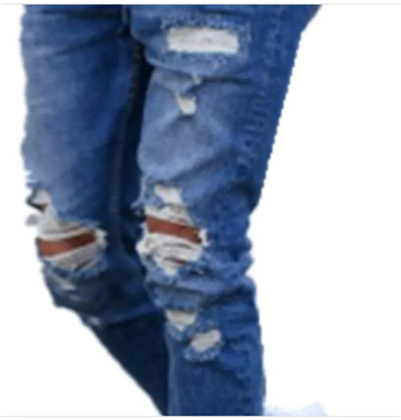 Deep blue men's jeans with distressed hole design showing cotton fabric texture