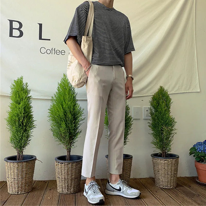 Men's straight-leg cotton casual trousers in khaki with a drawstring waistband.