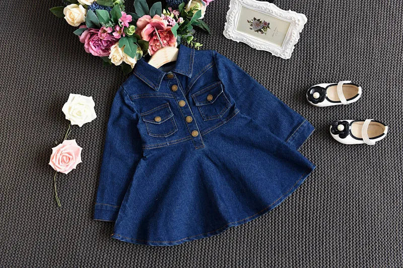 Girls navy denim dress with long sleeves and irregular skirt, cotton-rich fabric, sizes 100-140cm.