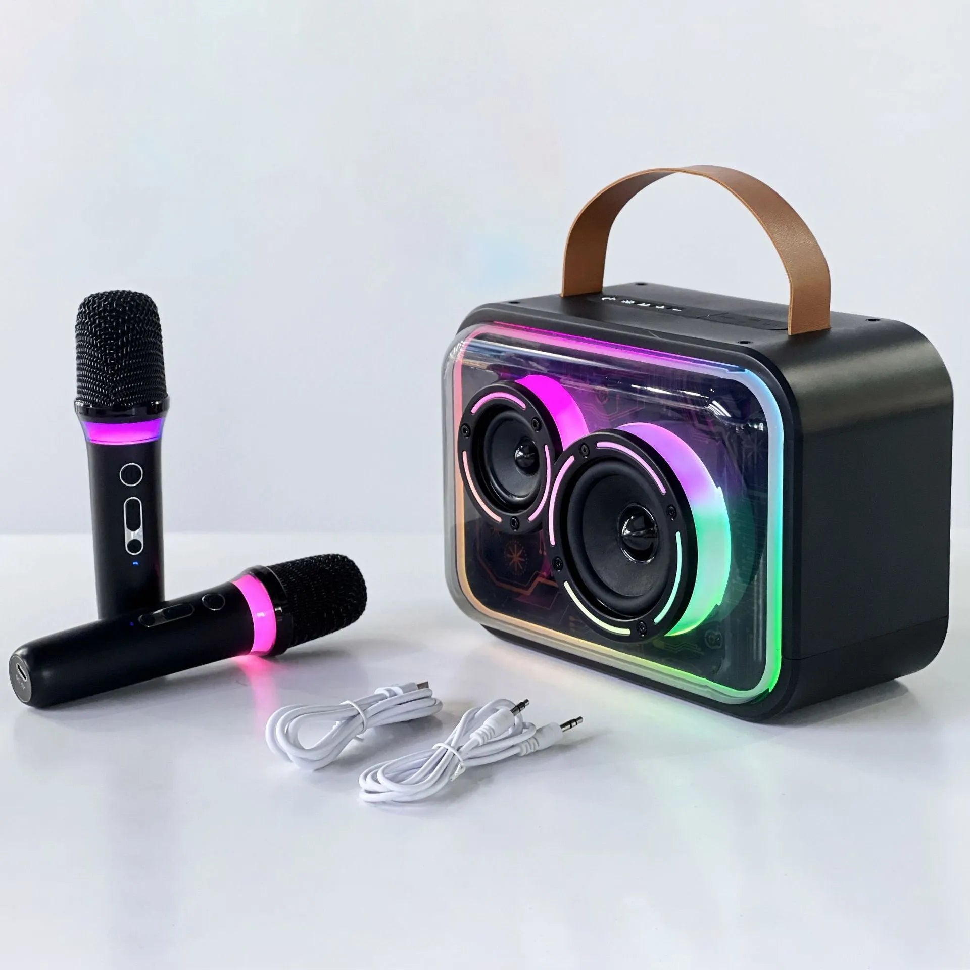 Light yellow portable Bluetooth speaker with RGB lighting and a wireless microphone on a table