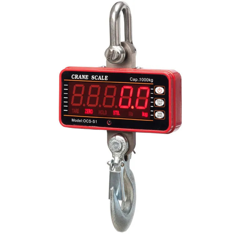 Orange electronic crane scale with digital display, showing 500 kg maximum capacity for industrial weighing.