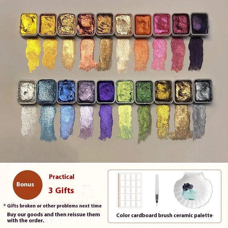 Traditional Chinese painting watercolour set showing pots of red, white gold, warm, and cold colour paints.