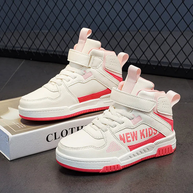 Children's street sneakers in multiple colours with PU upper and rubber sole showing lace-up buckle fastening