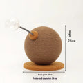 Tumbler-style cat scratch board with woven hemp rope surface and an integrated cat grasping ball toy.
