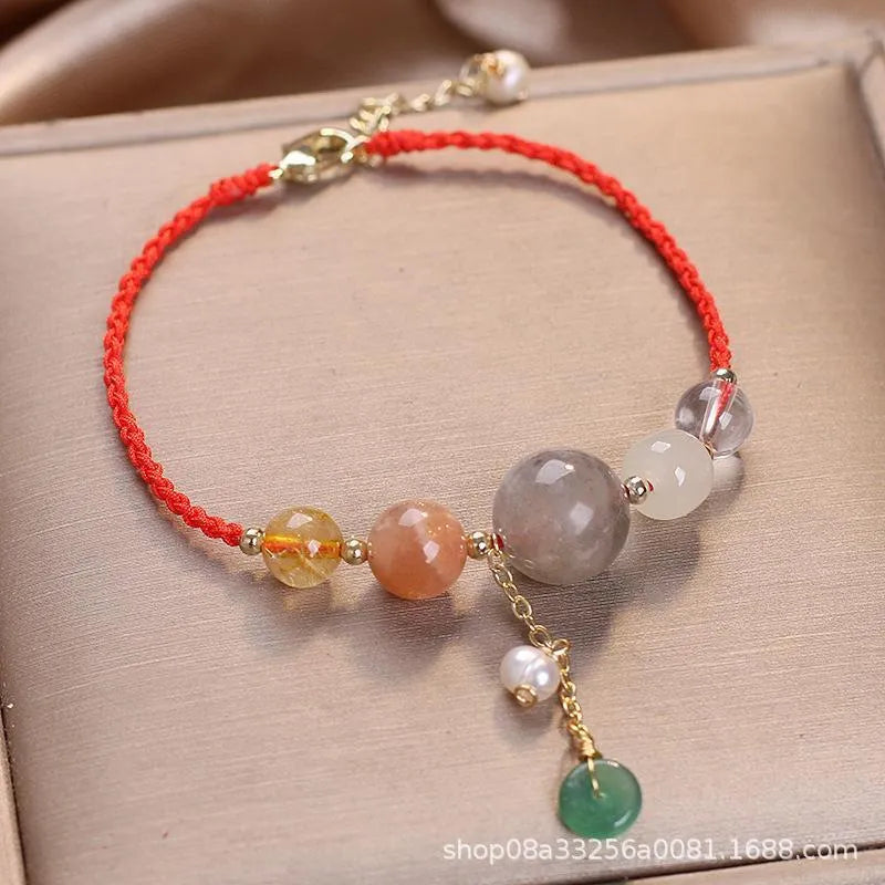 Hand-woven women's crystal bracelet with peace buckle clasp and sequin accents