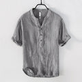 Grey striped linen short sleeve pullover top for men laid flat