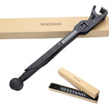 Black folding portable laptop stand made of reinforced nylon, shown open and folded to 4cm depth.