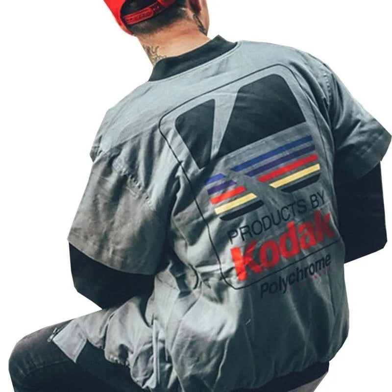 Hip hop style printed baseball jacket in Grey with round neck and side slit pockets on a model