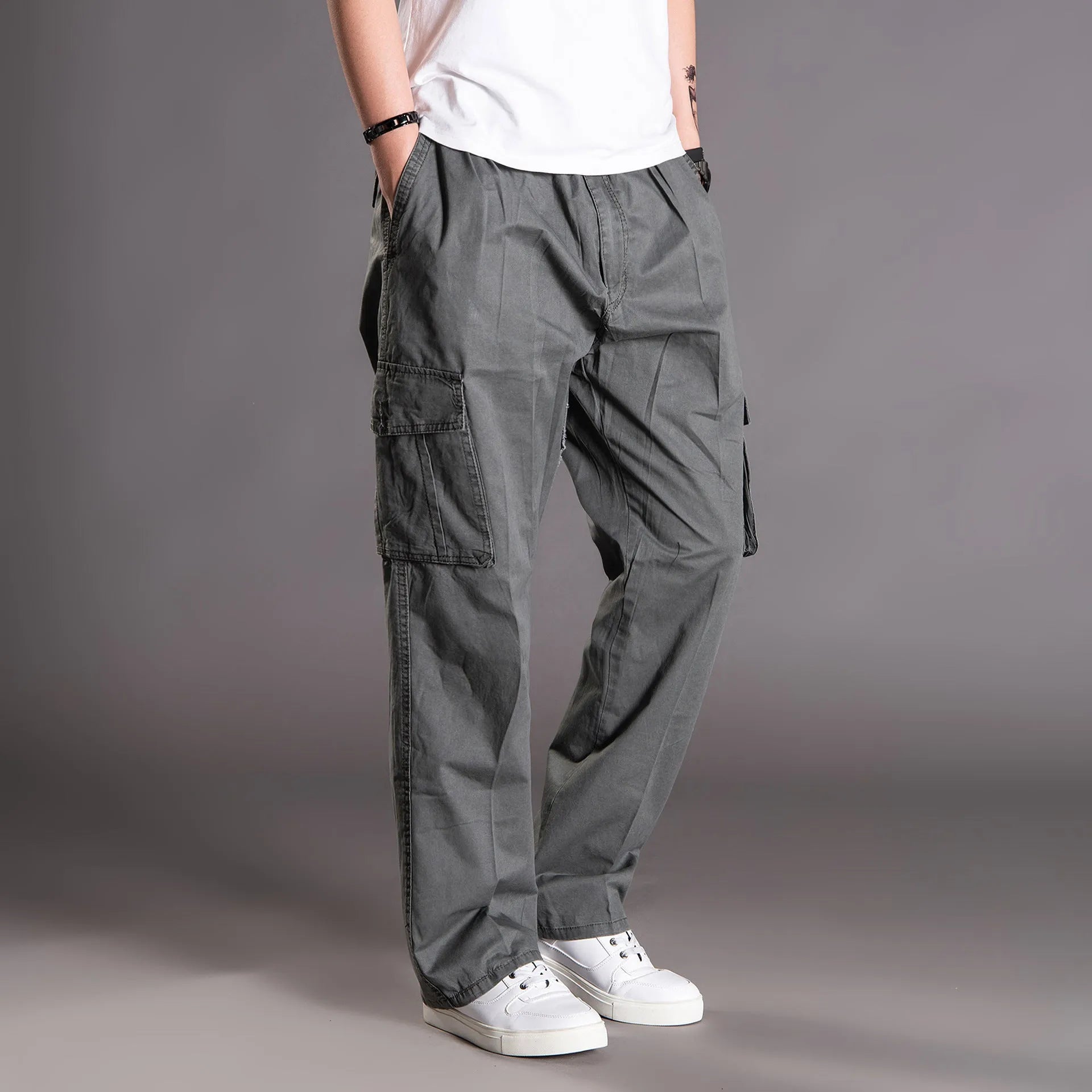 Cotton loose straight leg cargo trousers in black with multiple pockets and zip fly
