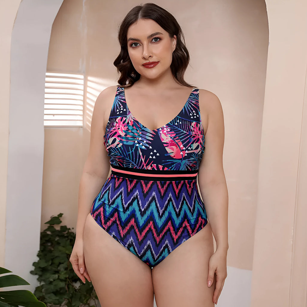 Women's printed one-piece swimsuit with spaghetti straps and a striped vest design.