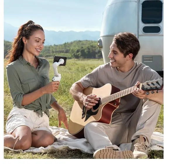 Magnetic smartphone PTZ gimbal stabiliser with battery compartment visible